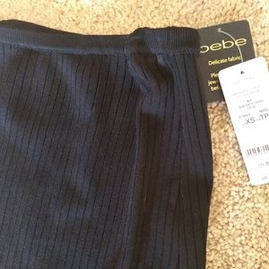 Bebe xs stretch fit and flare midi skirt $79